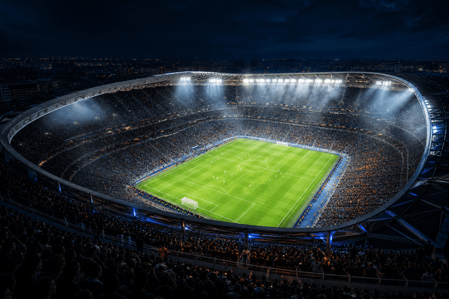 World-class football stadium packed with fans under dramatic floodlights at night
